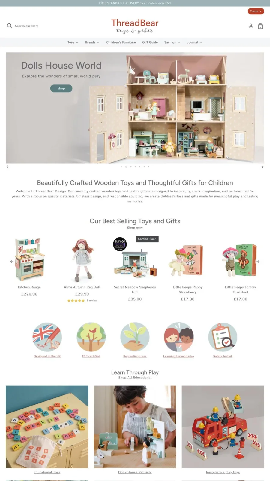 The ThreadBear Design Shopify store homepage on a laptop
